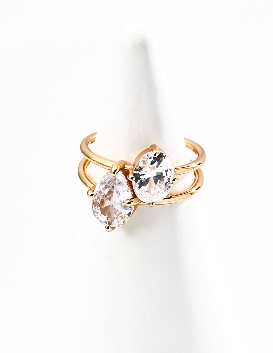S925 Silver Cubic Zirconia Ring Vintage Gold Platinum Finish displayed on a ring holder with two sparkling stones