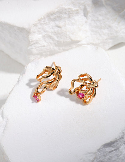 ribbon design asymmetric earrings, S925 silver ribbon earrings, asymmetric gemstone earrings, cubic zirconia jewelry, modern elegant earrings, artistic silver earrings