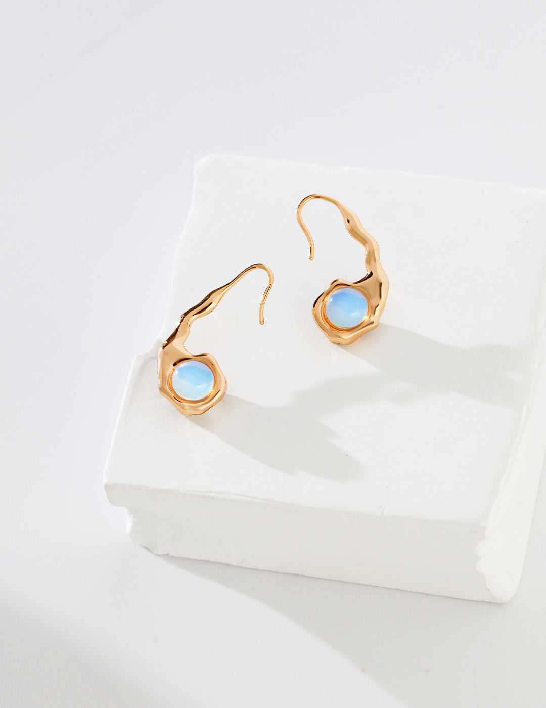 dual-sided opal agate earrings, S925 sterling silver earrings, opal agate gemstone earrings, fluid artisan design, dual-sided gemstone earrings, elegant gemstone jewelry