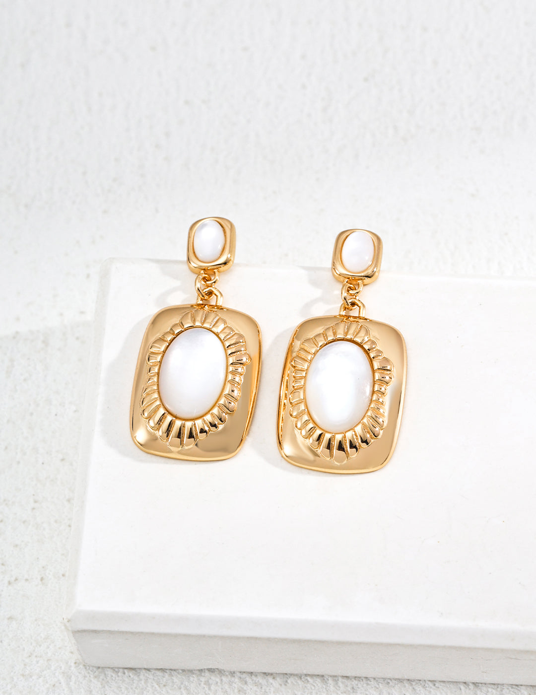 vintage mother of pearl earrings, 925 sterling silver pearl earrings, artisanal pearl earrings, classic pearl jewelry, elegant shell earrings, timeless pearl design, 