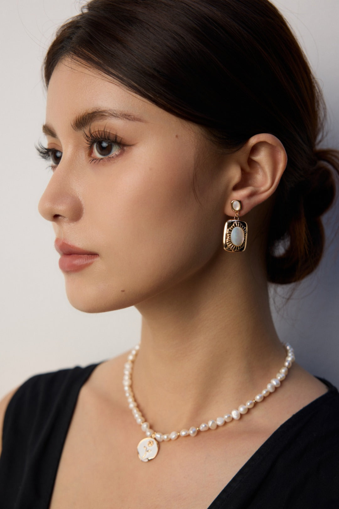 vintage mother of pearl earrings, 925 sterling silver pearl earrings, artisanal pearl earrings, classic pearl jewelry, elegant shell earrings, timeless pearl design, 