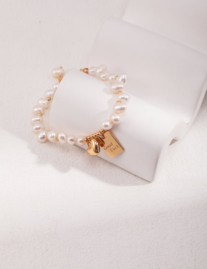 Natural Pearl Bracelet , pearl charm bracelet, S925 pearl bracelet, heart charm bracelet, good luck jewelry, pearl charm bracelet, silver pearl bracelet, heart charm bracelet, good luck jewelry, S925 sterling silver bracelet, natural pearl jewelry, meaningful gift bracelet